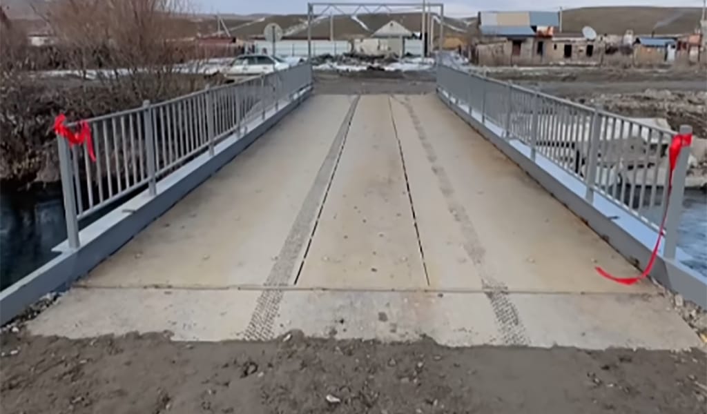 ЖАҢА КӨПІР САЛЫНДЫ