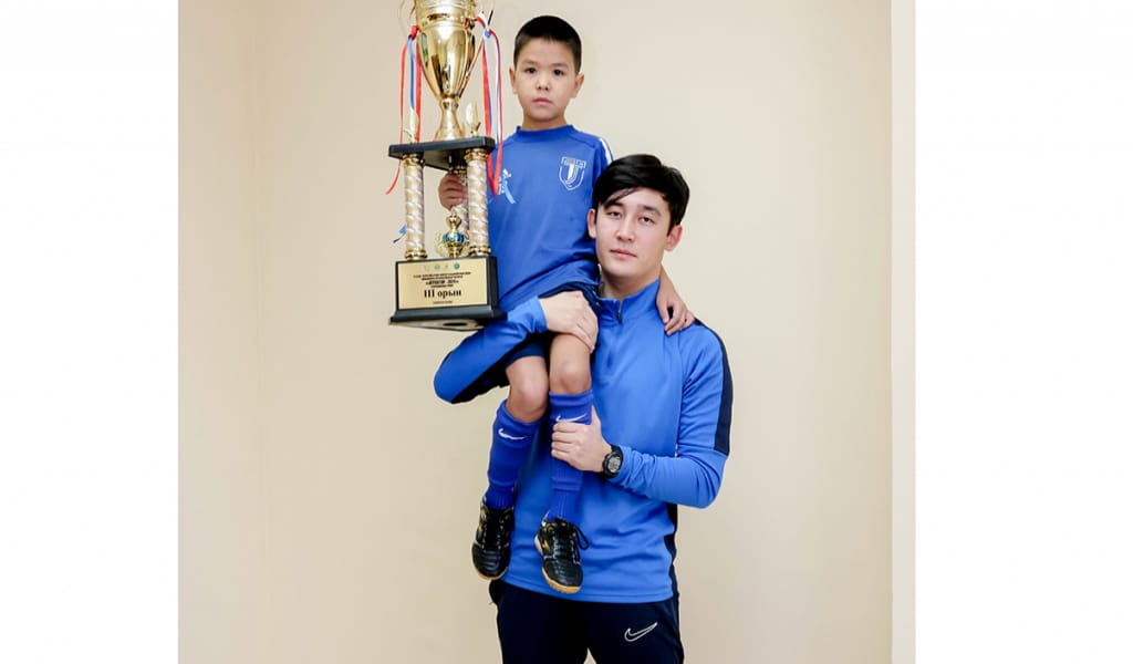 Доп ұстап туған балақай